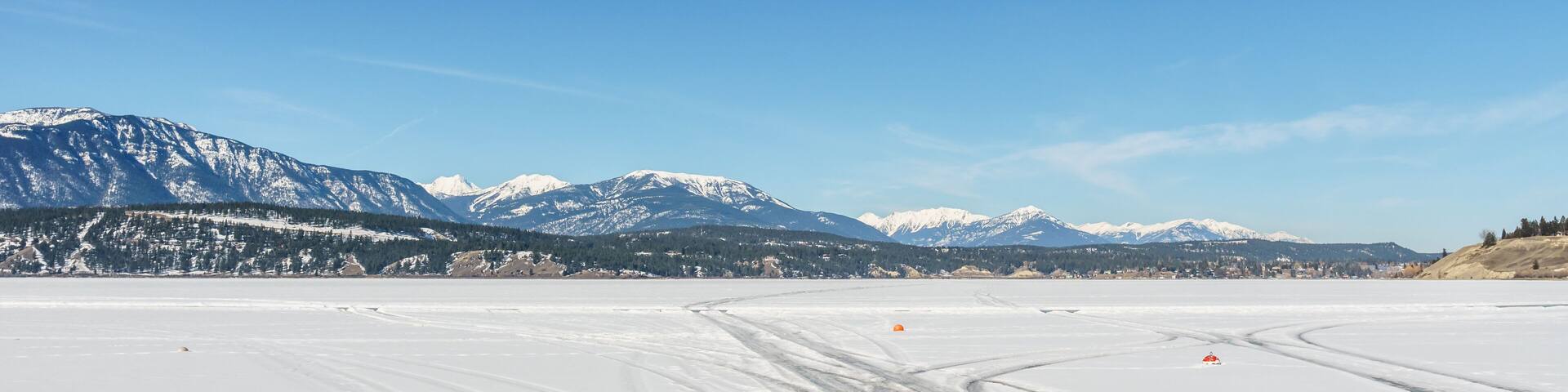 early spring landscape of frozen Windermere Lake Regional District of East Kootenay Canada.