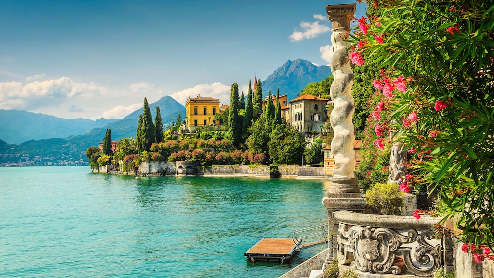 Famous luxury villa Monastero, stunning botanical garden decorated with mediterranean oleander flowers, lake Como, Varenna, Lombardy region, Italy, Europe, Shutterstock ID 1006668772, Purchase Order: