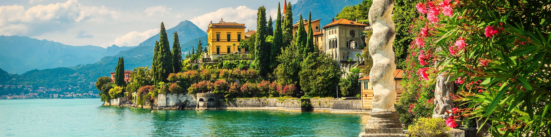 Famous luxury villa Monastero, stunning botanical garden decorated with mediterranean oleander flowers, lake Como, Varenna, Lombardy region, Italy, Europe, Shutterstock ID 1006668772, Purchase Order:
