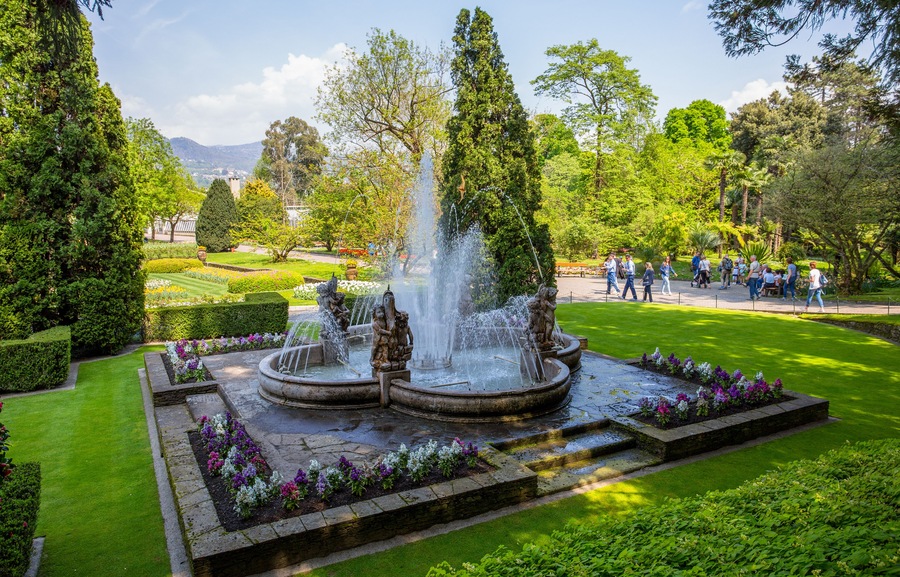 PALLANZA, ITALY, APRIL 25, 2018 - View of Putti Fountain in the botanical garden of Villa Taranto in Pallanza, Verbania, Italy.