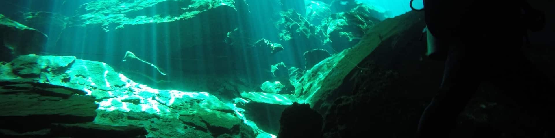 This was my first cenote diving experience. As you swim through the dark caves you suddenly round a corner to have the most brilliant green light shining through a small opening and reflecting on the rocks. An experience no diver should miss! #lifeatexpedia