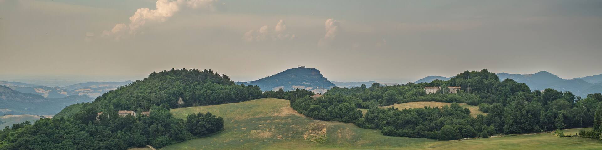 Typical summer landscape of the Bologna Apennines, between Loiano and Monterenzio; in the middle Monte delle Formiche (Mount of the Ants); Metropolitan City of Bologna, Emilia-Romagna, Italy.