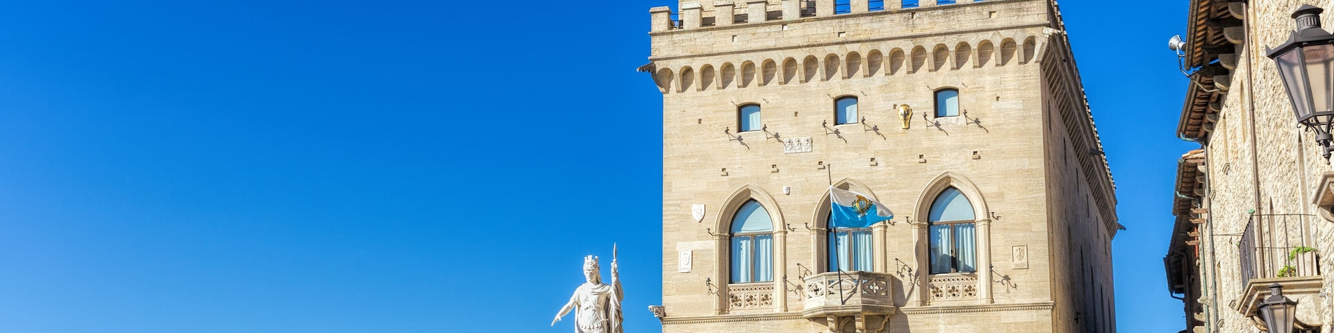 Central square of San Marino. Public Palace and statue of Liberty
