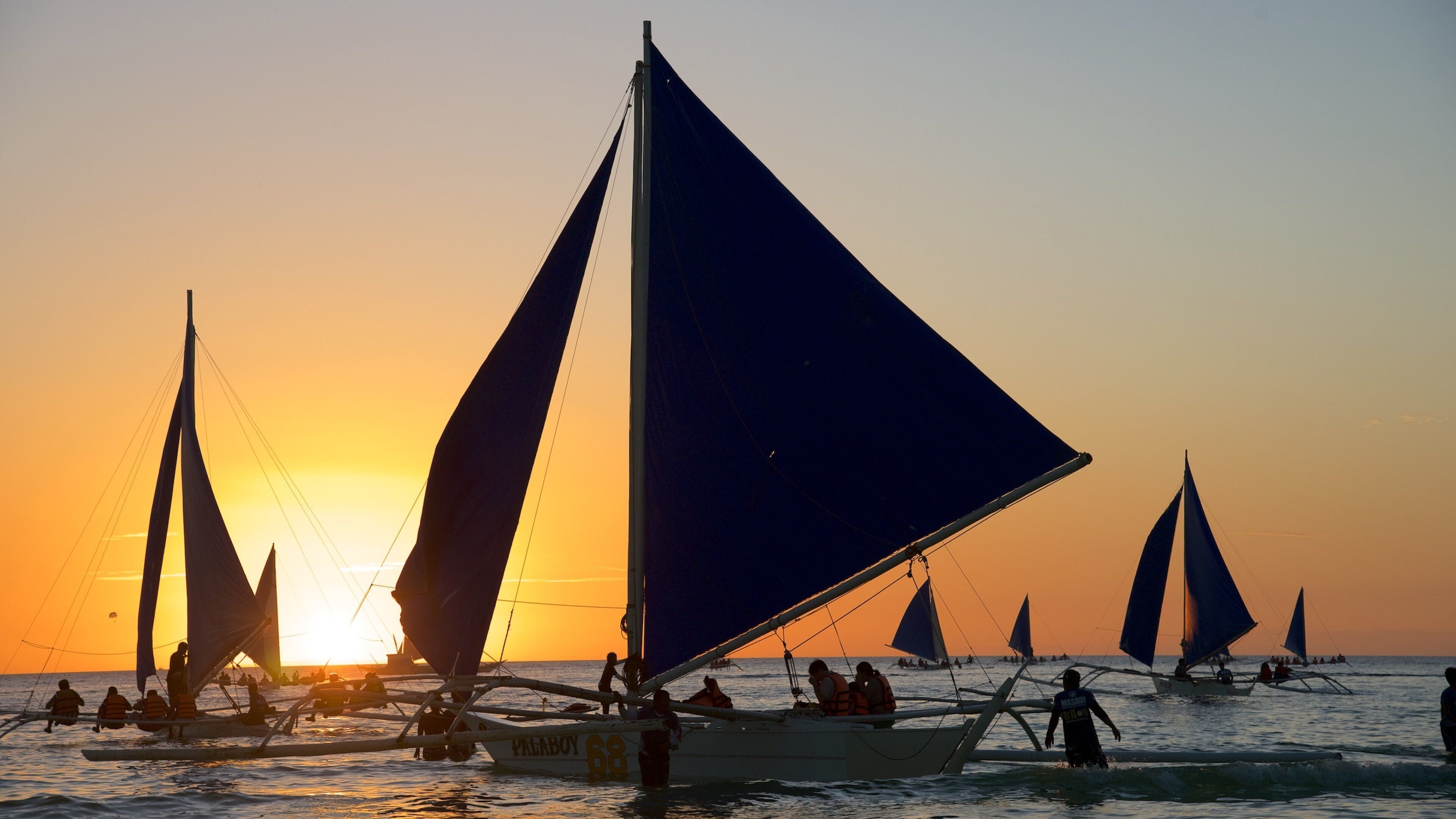 Boracay Island showing general coastal views, a sunset and sailing