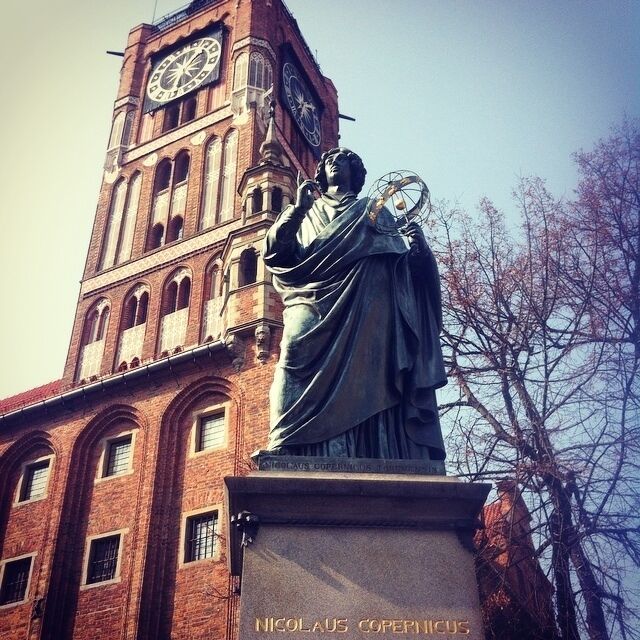 Admiring a genius.                                                 Don't forget to climb the tower hall. And when u are on the top take a look at a house under the golden star 🌟