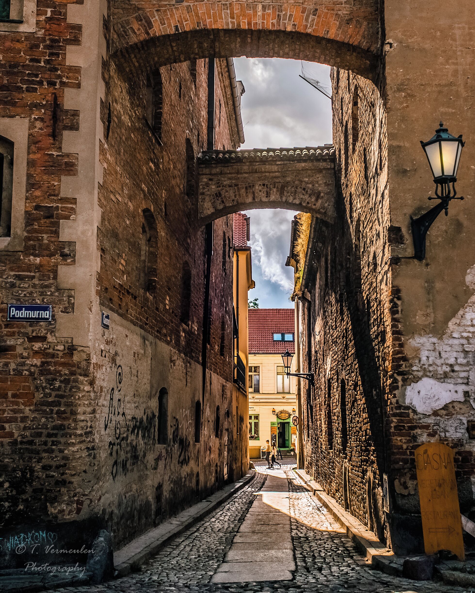 Small passage on the way to the ruins of old castle of Torun. 