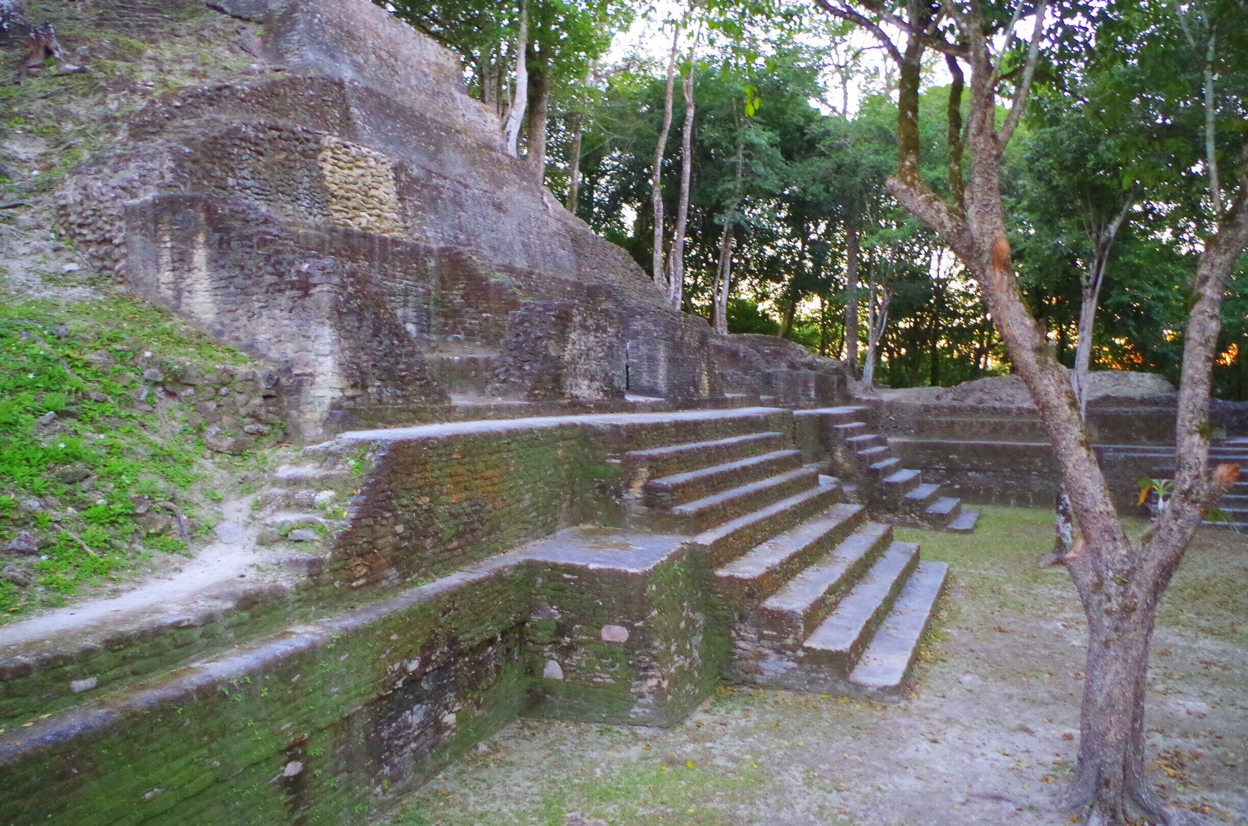 Cahal Pech is a Maya site located near the Town of San Ignacio in the Cayo District of Belize. The site was a palatial, hilltop home for an elite Maya family, and though most major construction dates to the Classic period, evidence of continuous habitation has been dated to as far back as 1200 BCE during the Early Middle Formative period, making Cahal Pech one of the oldest recognizably Maya sites in Western Belize. The site rests high above the banks of the Macal River and is strategically located to overlook the confluence of the Macal River and the Mopan River. The site is a collection of 34 structures, with the tallest temple being about 25 meters in height, situated around a central acropolis. The site was abandoned in the 9th century CE for unknown reasons.