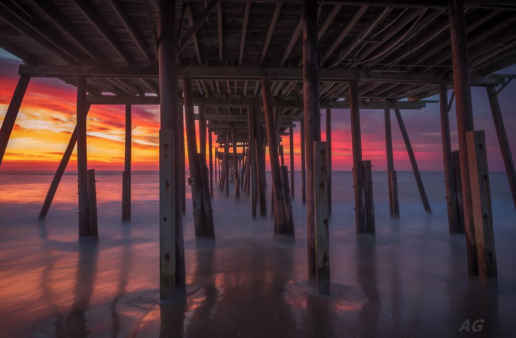 Another capture from my series at Cape Hatteras Fishing Pier. I've always wanted to capture an image from under the pier but I've never had the right lighting or conditions to make it stick. On this day, everything clicked to let me capture an image that I'd visualized from the very first day I started taking photography seriously.

This image is a blend of 3 exposures to bring out detail in a highly dynamic scene and has been processed using luminosity masks in Photoshop. Luminosity Masks are the one of the most powerful tools I've ever used and it really does make a huge difference to the end result.

I visited the Graveyard of the Atlantic museum that is just down the road on this trip. It has a fascinating history of all the shipwrecks that have happened around the Outerbank Islands and has pictures and artifacts from some of the actual wrecks themselves. If you like scuba diving, you can actually dive to some of the wrecks themselves. 

Thank you for stopping by.

#OBX #Outerbanks #Sunrise #Frisco #NC #USA #Pier #colorful #goldenhour #weekend #roadtrip #waterlust #abandoned #bestof5 