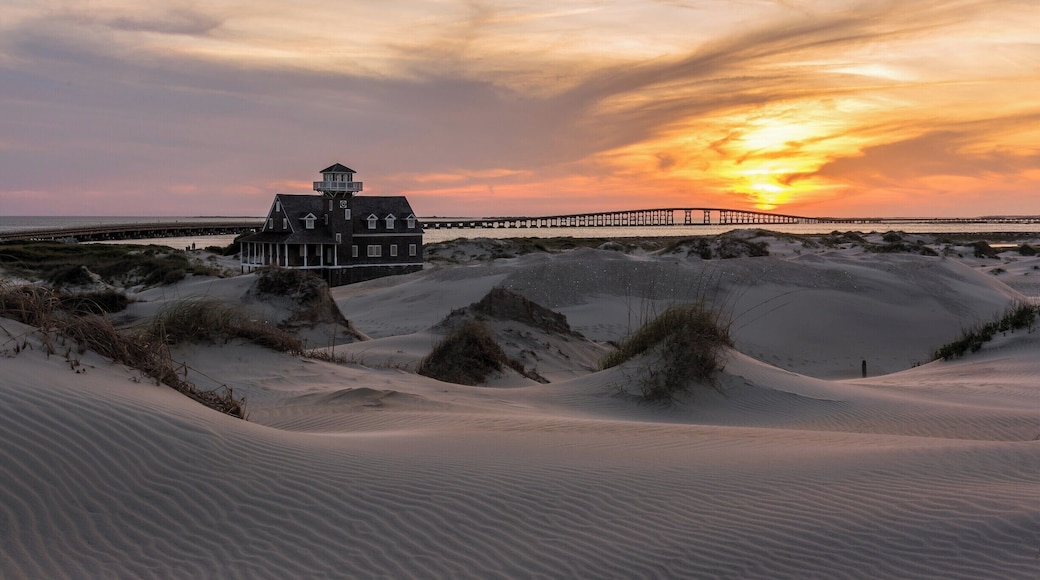 Bonner Bridge is one of North Carolina's most well known man-made structures of it's kind (The Linn Cove Viaduct on the Blue Ridge Parkway is probably the most well known). This location makes for a great getaway at the Outerbanks to spend an entire day (and night). The location is popular for fishing and is ideal for landscape and astro photography. You can have lots of fun on some of the dunes, although getting the sand out afterwards is a big hassle.
This is one of my favorite images from this location. I love the warm light tones and the shadows that create a contrast in the foreground sand. It is created from a single exposure with only minor modifications made to adjust overall contrast and brightness.
If you are interested in wildlife, the Pea Island Wildlife Refuge is nearby and is a very popular location.
Thank you for stopping by.
#NC #Sunset #Bridge #OBX #BonnerBridge #colorful #roadtrip #weekend #goldenhour #beaches #abandoned #USA #beach #history