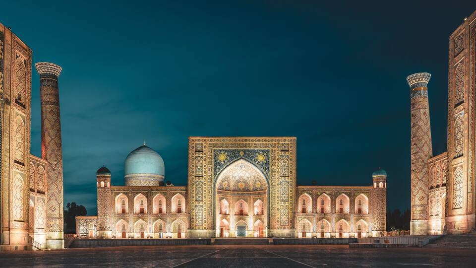View to Registan Square at Night in Samarkand Uzbekistan