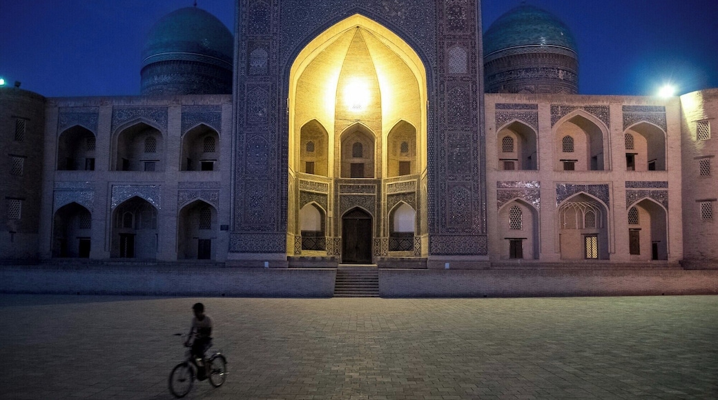 Slipping through Bukhara's courtyards at night.