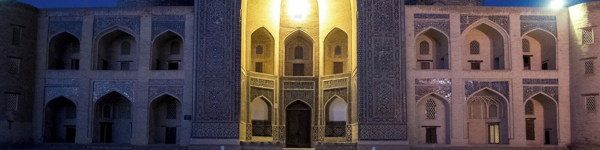 Slipping through Bukhara's courtyards at night.