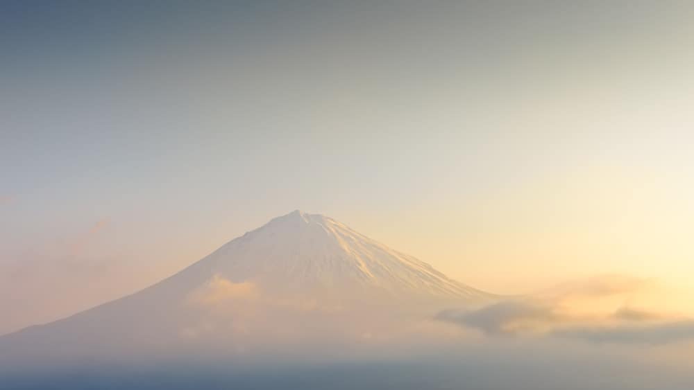 Fuji mountain with sunrise sky, close up snow capped mount fuji.
