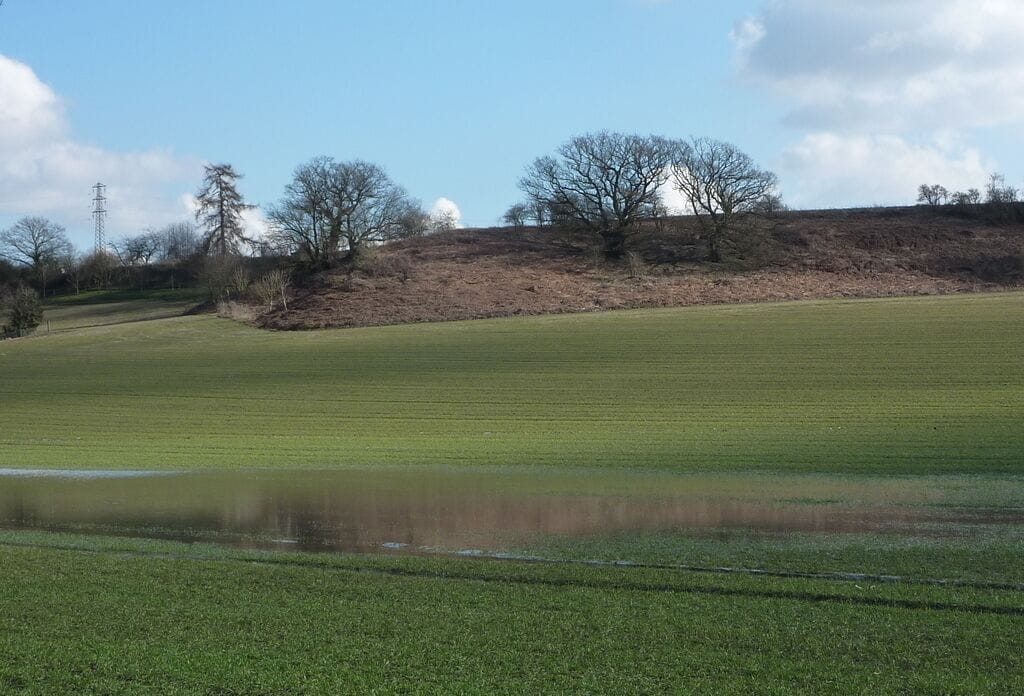 Flooded field below Oak Hill Seen from the road between Needham Market and Barking.