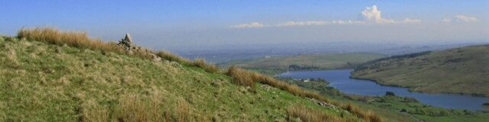 Cairn on Jock's Castle Camphill Reservoir below.