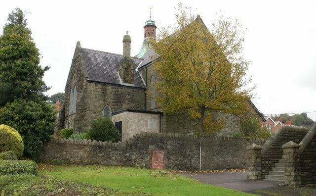 St Hilda's Church , Griffithstown, Pontypool. The view of the church from the southeast, on Kemys Street. St Hilda's Church is the Church in Wales (Anglican) parish church of Griffithstown. Built in 1887, it is a stone edifice in the Early English style, consisting of chancel, nave, aisles and south porch. 1577404 to view from the southwest.