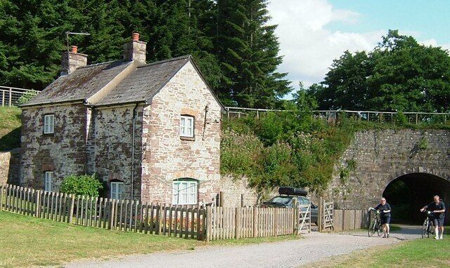 Canal Keepers house, by bridge under canal Walkers, and bikers use the bridge under the canal to reach refreshments at the visitor centre.