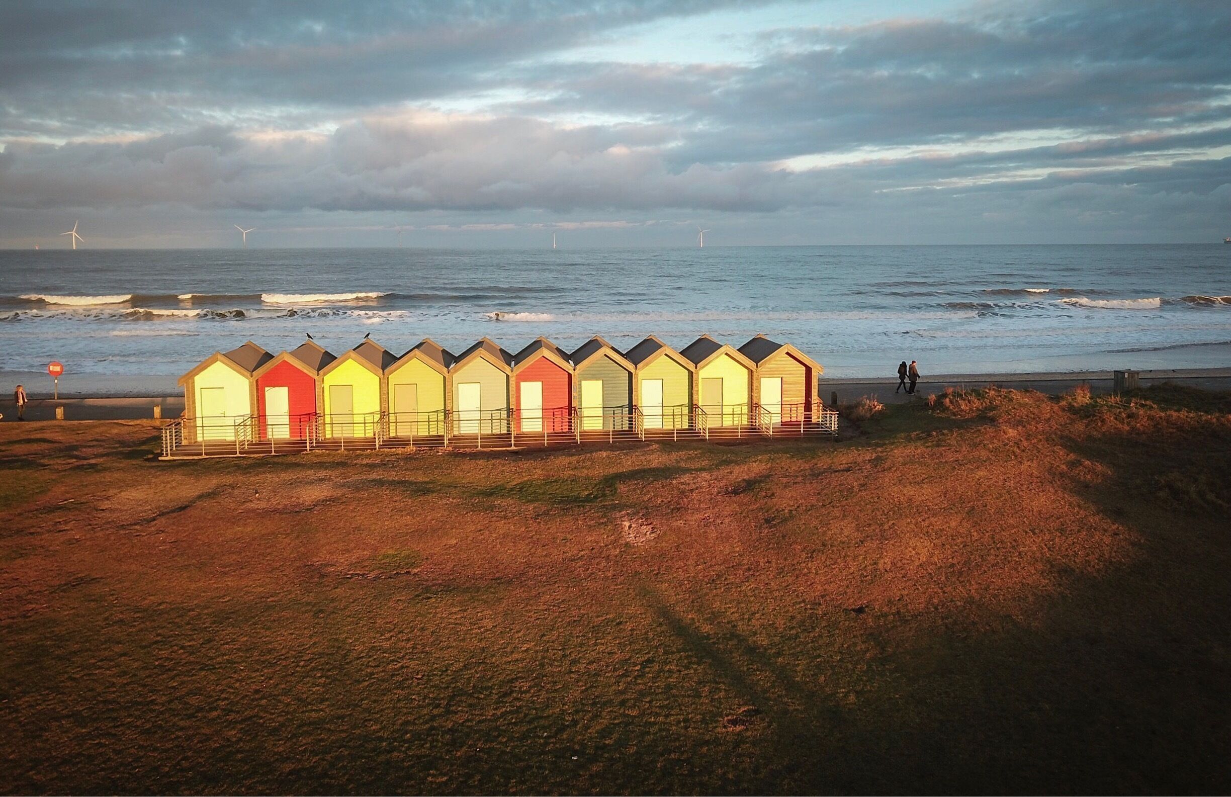 An arial image of the beach huts at Blyth in the evening light