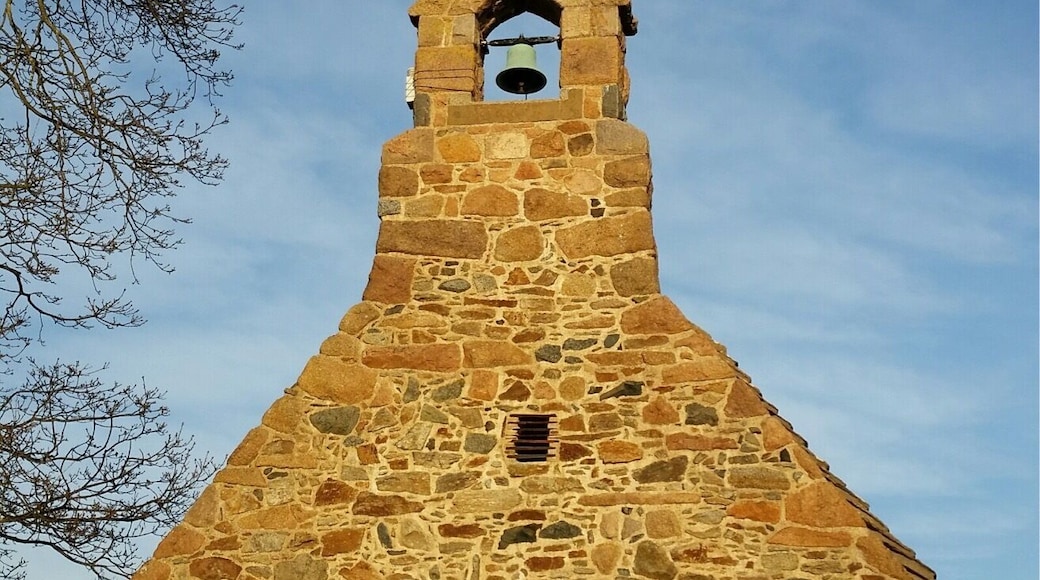 The sun hits St. Apoline's, a tiny chapel near Perelle in Guernsey.