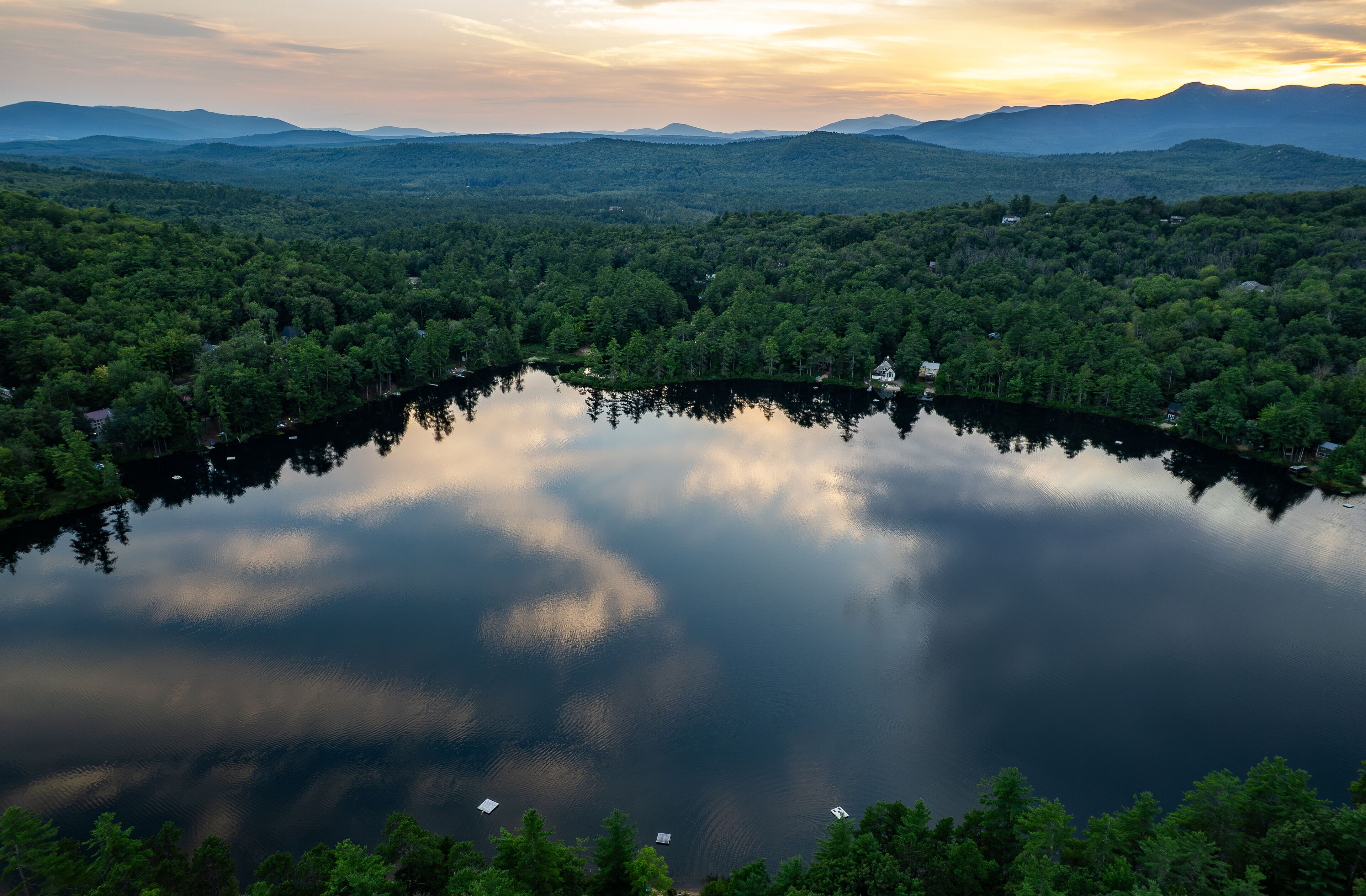 Aerial view of a sunset on a New Hampshire lake in the White Mountains
-Madison, NH 