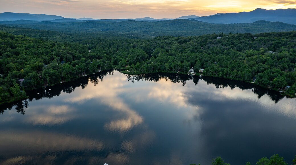 Aerial view of a sunset on a New Hampshire lake in the White Mountains
-Madison, NH
