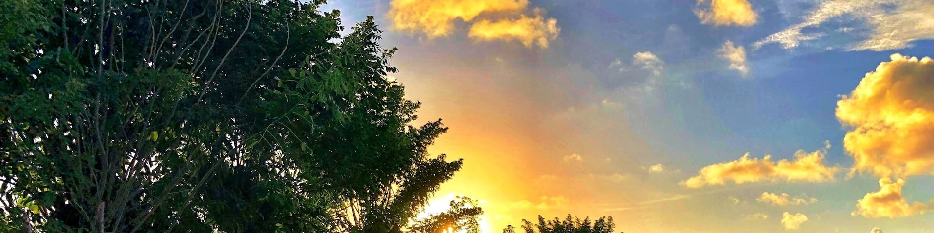 Flat tire in the Dominican Republic. At least we had a beautiful view of sunset.