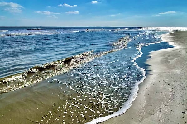 I hit the beach despite the cold and wind. Where there’s a will there’s a wave! 😎