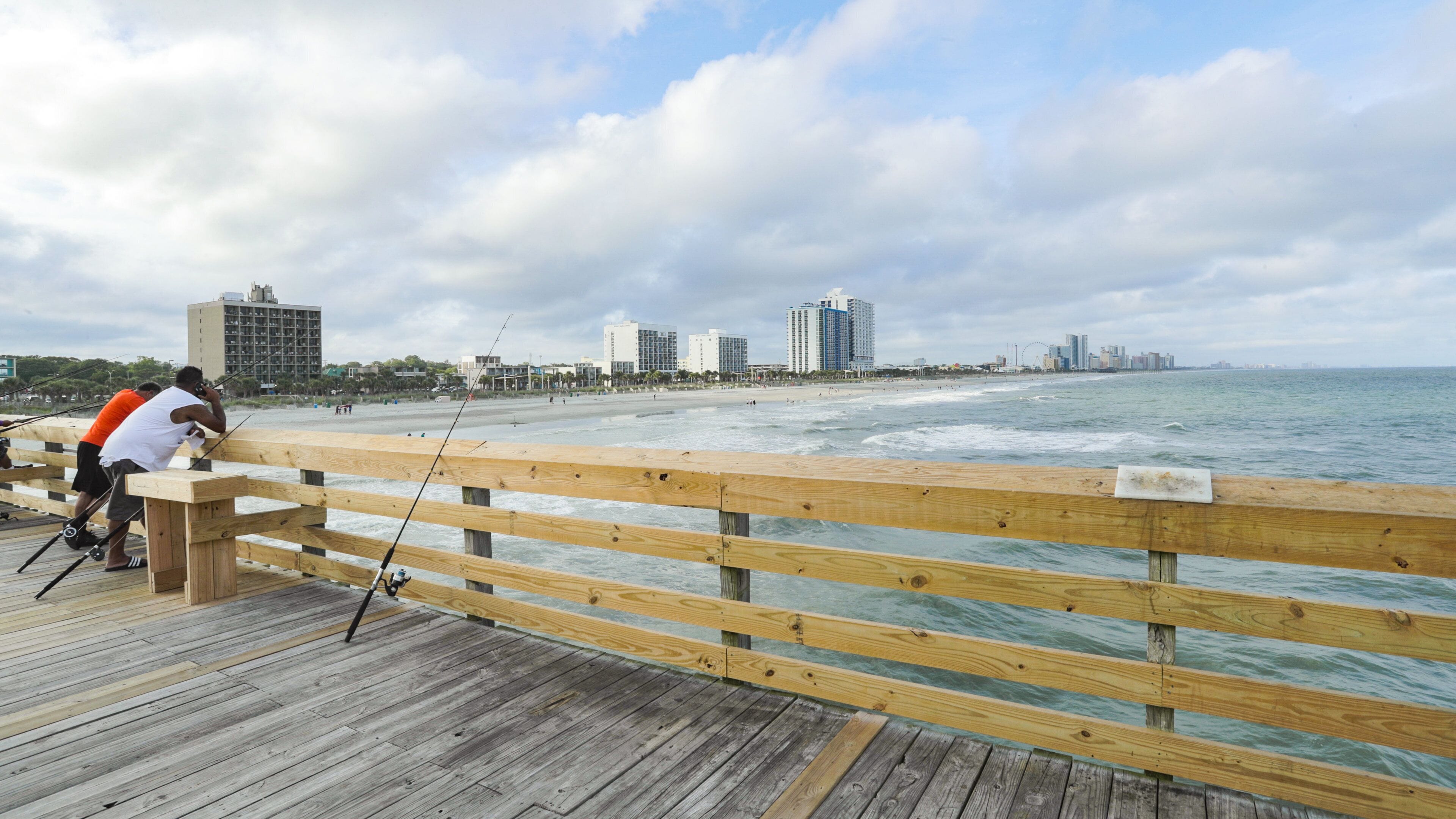 Myrtle Beach which includes general coastal views and fishing as well as a small group of people
