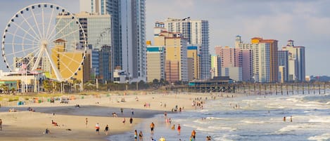 Myrtle Beach showing general coastal views, swimming and a city