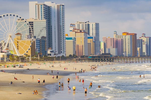 Myrtle Beach showing general coastal views, swimming and a city