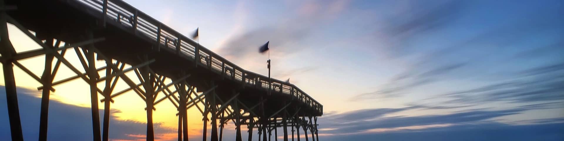 At the north end of the boardwalk in Myrtle Beach, you'll find pier 14. It makes a great place to watch the sunrise! #goldenhour