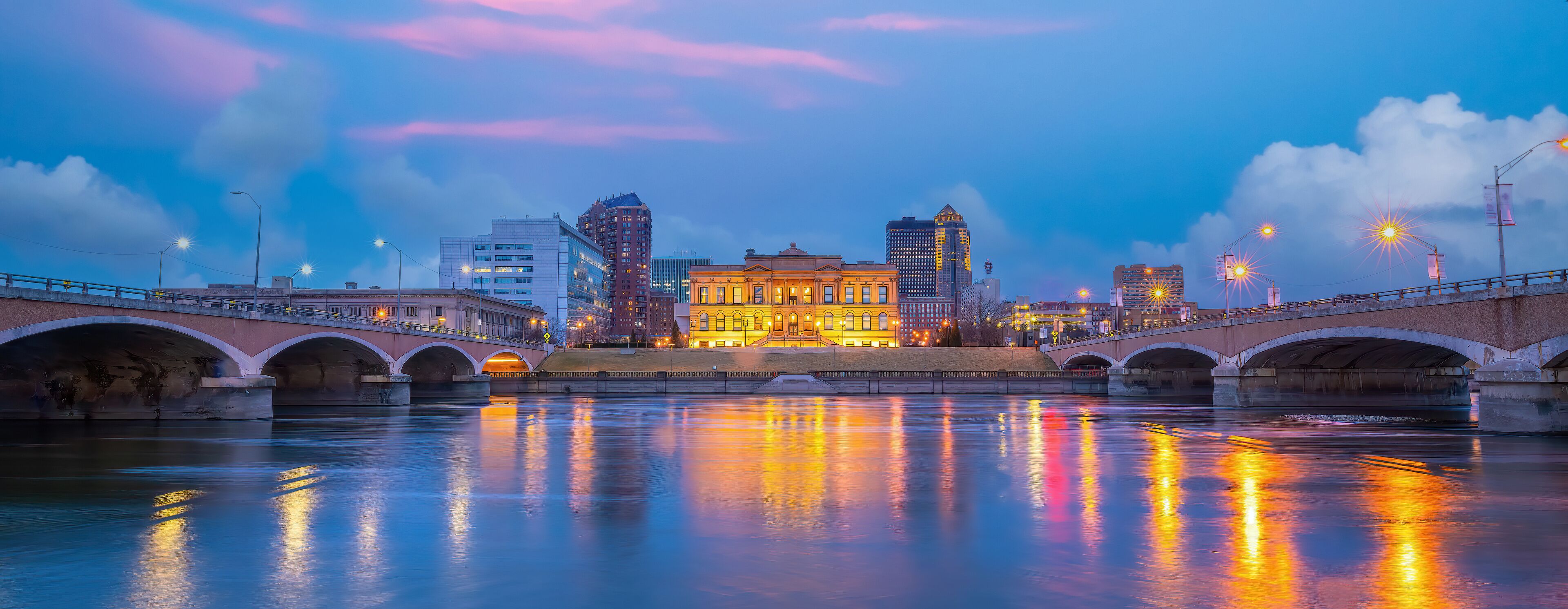 Downtown Des Moines city skyline cityscape of Iowa and public park in USA