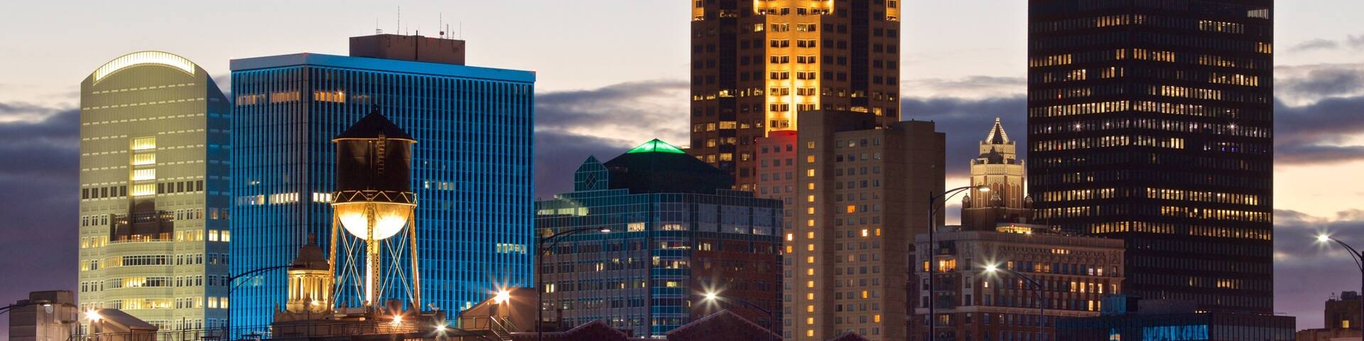 Des Moines featuring a skyscraper, a city and a sunset