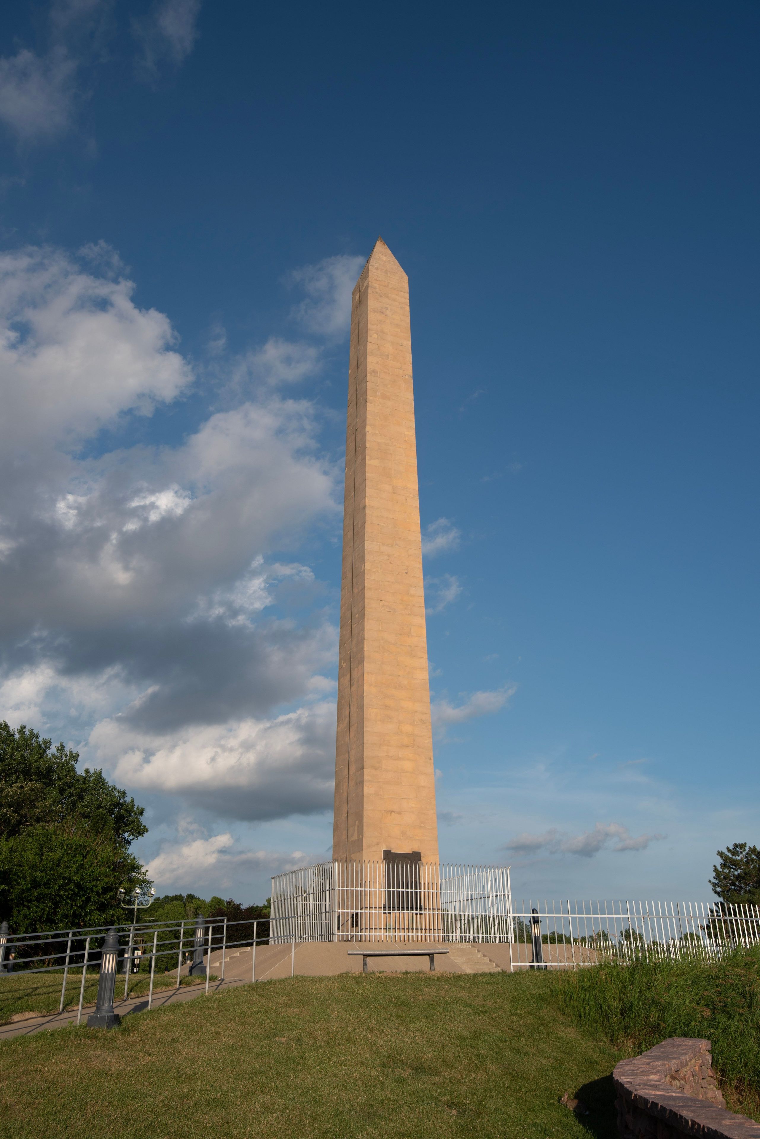 Vertical shot of Sergeant Floyd Monument on blue cloudy sky background in Sioux City, Iowa
