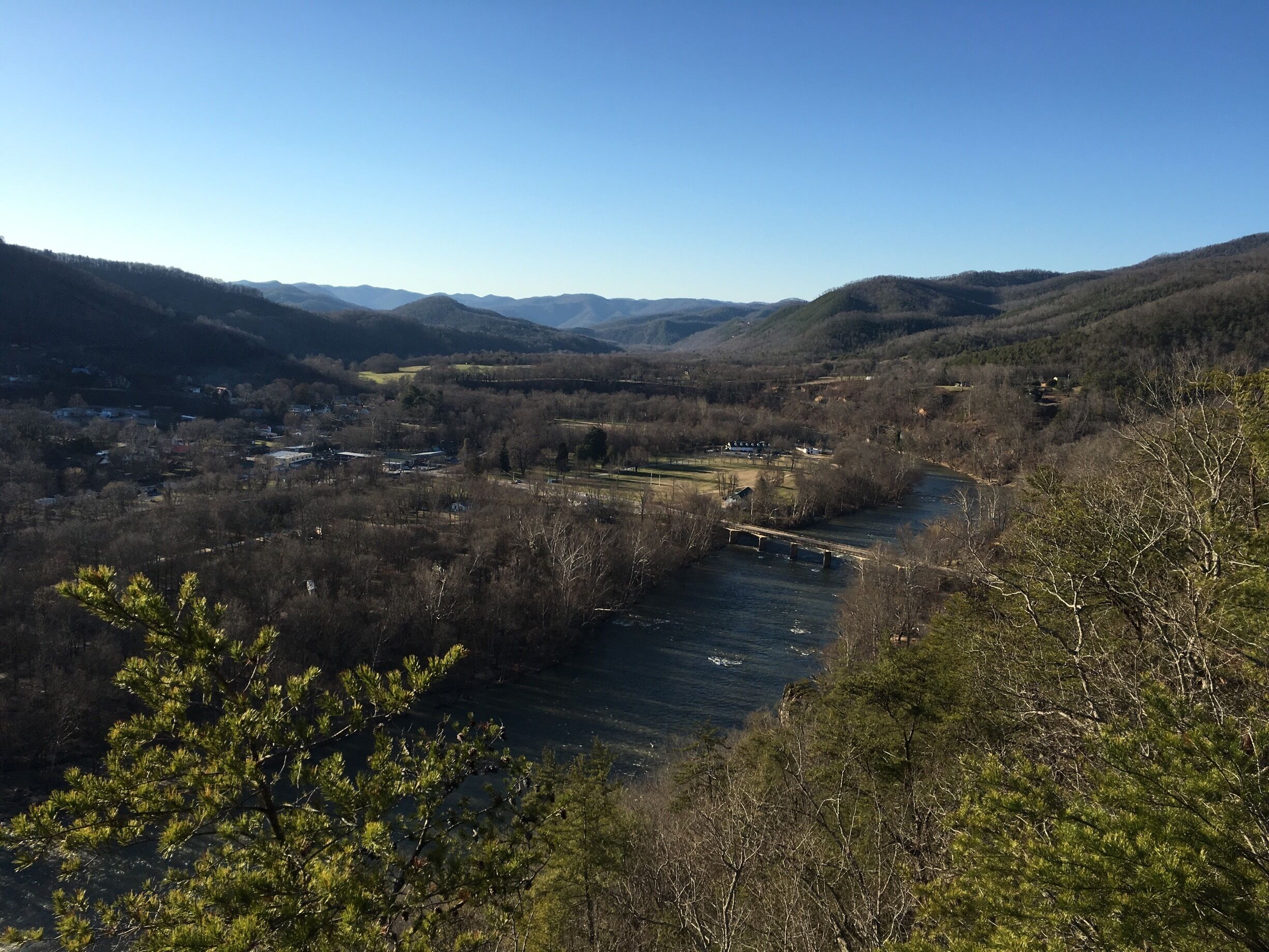 A view of the French Broad River from high atop the Lovers Leap Trail in Hot Springs NC. The French Broad is the 5th oldest river in the world, and the hike to this viewpoint only takes about 45 minutes. While on this hike, you'll actually spend a bit of time on the Appalachian Trail which makes the experience even cooler!!