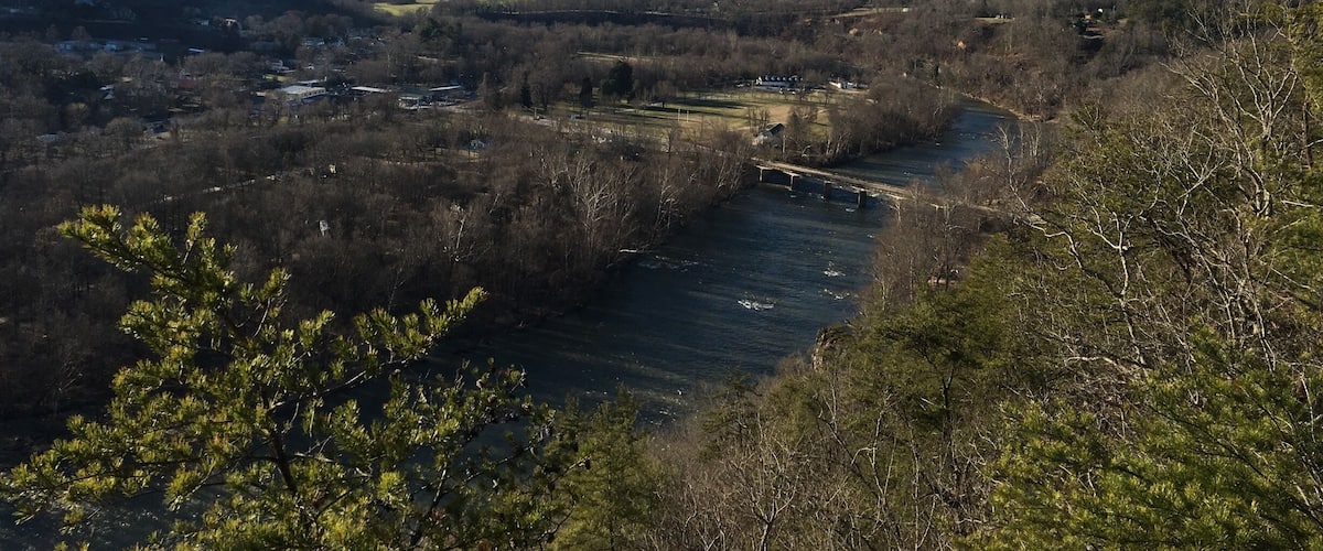 A view of the French Broad River from high atop the Lovers Leap Trail in Hot Springs NC. The French Broad is the 5th oldest river in the world, and the hike to this viewpoint only takes about 45 minutes. While on this hike, you'll actually spend a bit of time on the Appalachian Trail which makes the experience even cooler!!