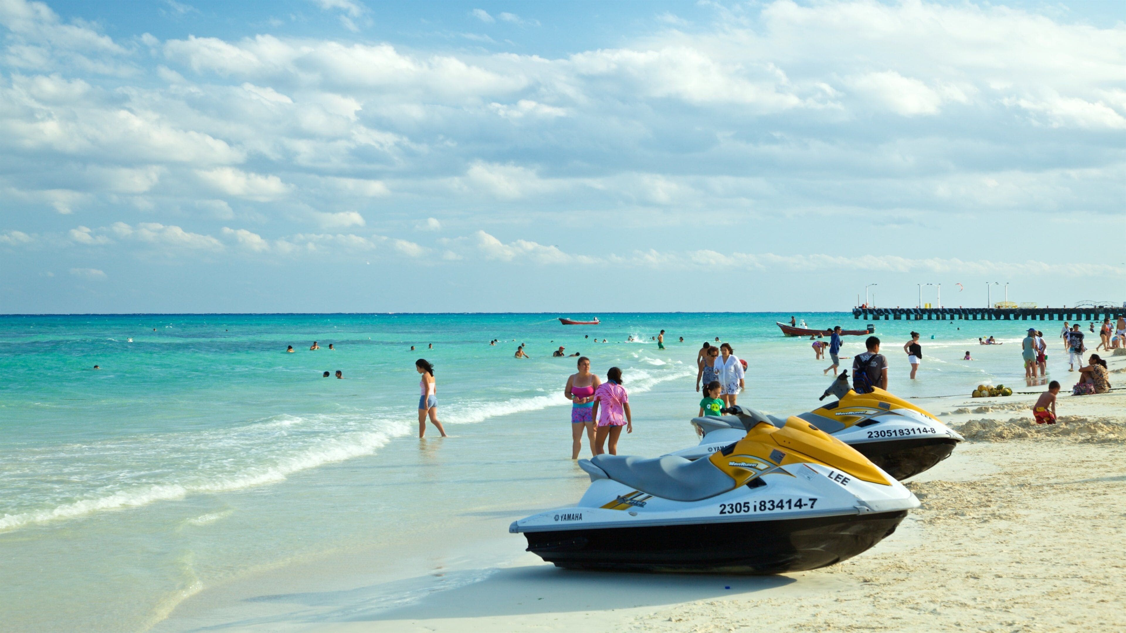 Playa del Carmen featuring a sandy beach, swimming and general coastal views