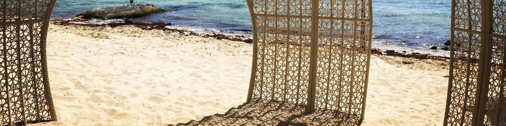 Shady spot on a beautiful sunny beach.