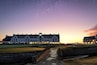 Early morning on the 18th at Carnoustie Golf Course. This is my home town and in the next few weeks it will host the Alfred Dunhill Links Championship so the greens are pristine and the stands are being erected. A nice walk early in the morning when no one else is around.