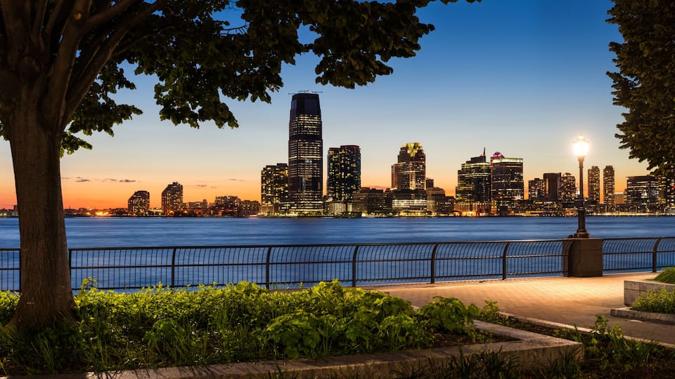 Jersey City Waterfront with Hudson River from Manhattan at Sunse