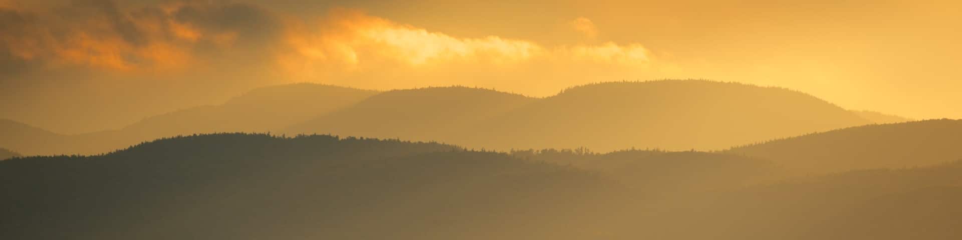 Burlington which includes a sunset and a lake or waterhole