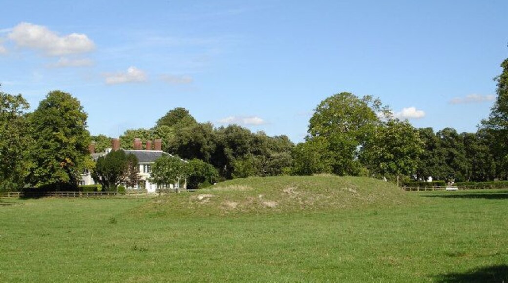 Elbrook House on the far side of a paddock. The paddock would appear to contain a tumulus which is not marked on the OS map.