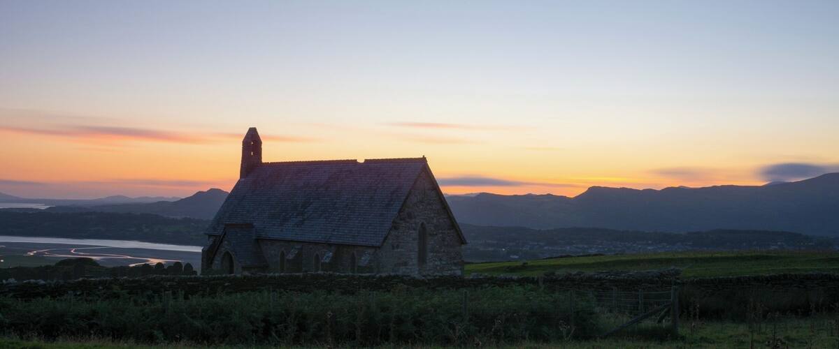 A favourite from my childhood holidays - St Tecwyn's Church. We used to camp close to this location and walk up there for sunset at least once a year. I didn't use any filters at all, and love the contrast given by the river estuary in the bottom left, reflecting the deep colours of the sunset.
#snowdonia #northwales #church #sainttecwyn #welshchurch #sunset #welshsunset #mountainrange #BvSApplication