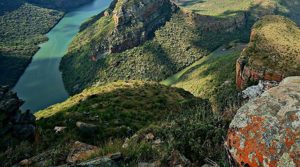 The Three Rondavels in the Blyde River Canyon are just one of many beautiful views you will get to see on a drive through the Panorama Route in South Africa.
If you go to Kruger National Park, the Panorama Route is a great addition to your South African Itinerary.
Spend the weekend exploring Lisbon Falls, Berlin Falls, Mac Mac Falls, Wonder View, the Pinnacle, Bourke's Luck Potholes, the Three Rondavels and God’s Widndow along this amazing route!
