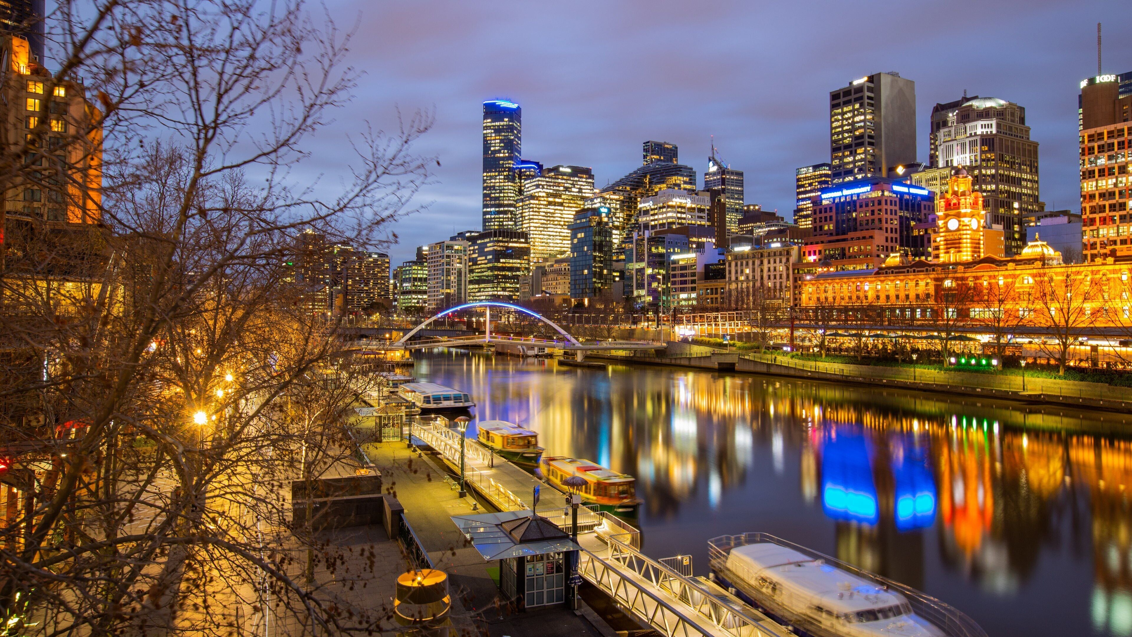 Southbank which includes a bay or harbor, night scenes and a city