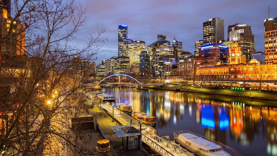 Southbank which includes a bay or harbor, night scenes and a city
