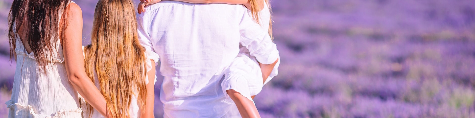 A family of four in a lavender field.
