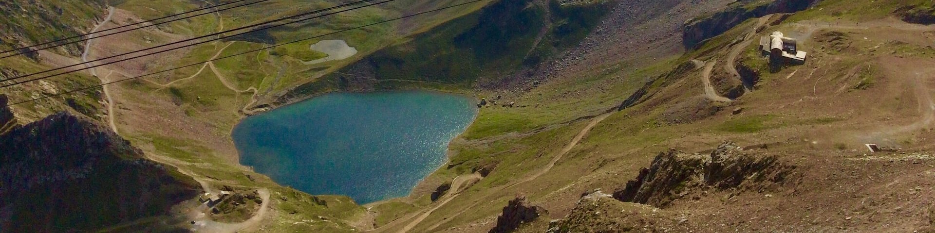 Drove up through cloudy valley to bright sunshine at the col and clouds were way below us when we reached the summit.