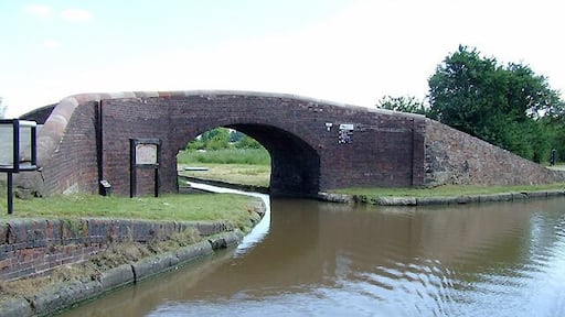 The Ashby Canal at Marston Junction, Warwickshire. The Ashby Canal Company was formed in 1792 with intention of connecting the Coventry Canal at Marston Jabbett with limeworks and new coalfields near Ashby-de-la-Zouch. The canal, when it was built, did not go further than Moira, a distance of 30 miles with no locks, following the 300 foot contour line. The hilly section beyond this was not constructed, an extensive system of tramroads being preferred. At present, the canal ends at Snarestone (22 miles), the last eight miles being abandoned because of mining subsidence. However, the latest Nicholson canal guide anticipates completion of extensive restoration activity by detailing the route as far as Conkers, past Moira. Here is Dr Clifton's photograph from 1976. 462867