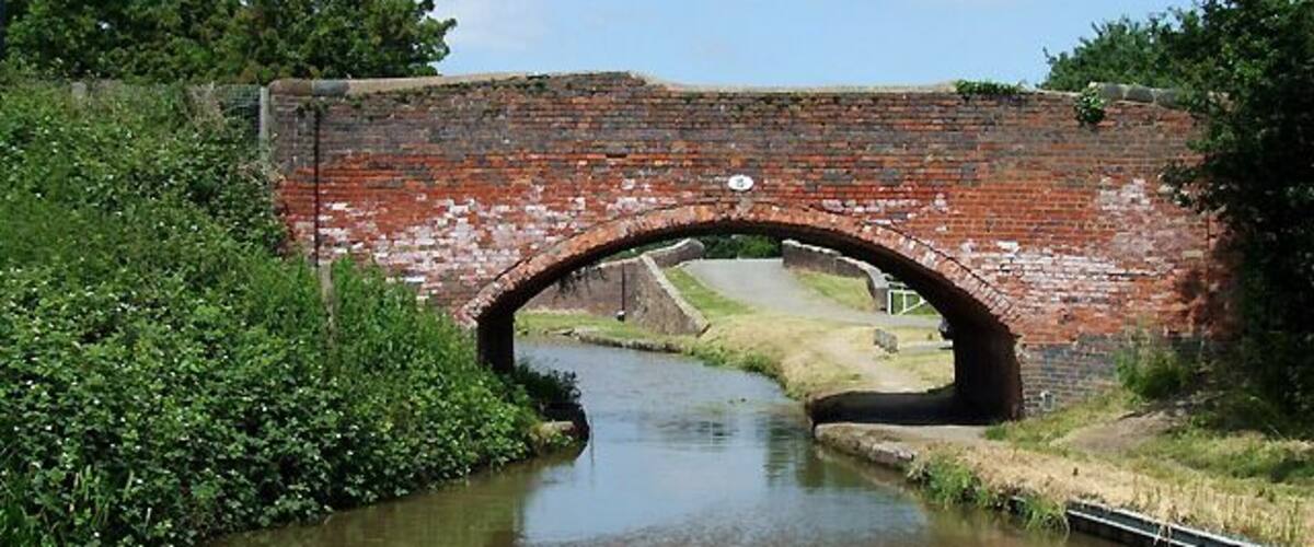 Marston Bridge, Coventry Canal near Bedworth, Warwickshire This is bridge No 15 counting from Hawkesbury Junction. Beyond the bridge the towpath can be seen crossing the Ashby Canal at Marston Junction.